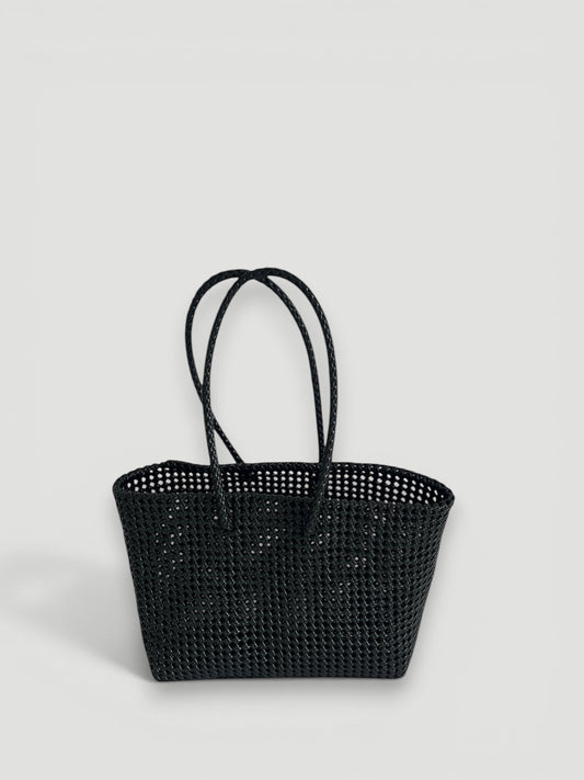 MOKA large black woven tote bag made from recycled plastic and silk with braided handles.